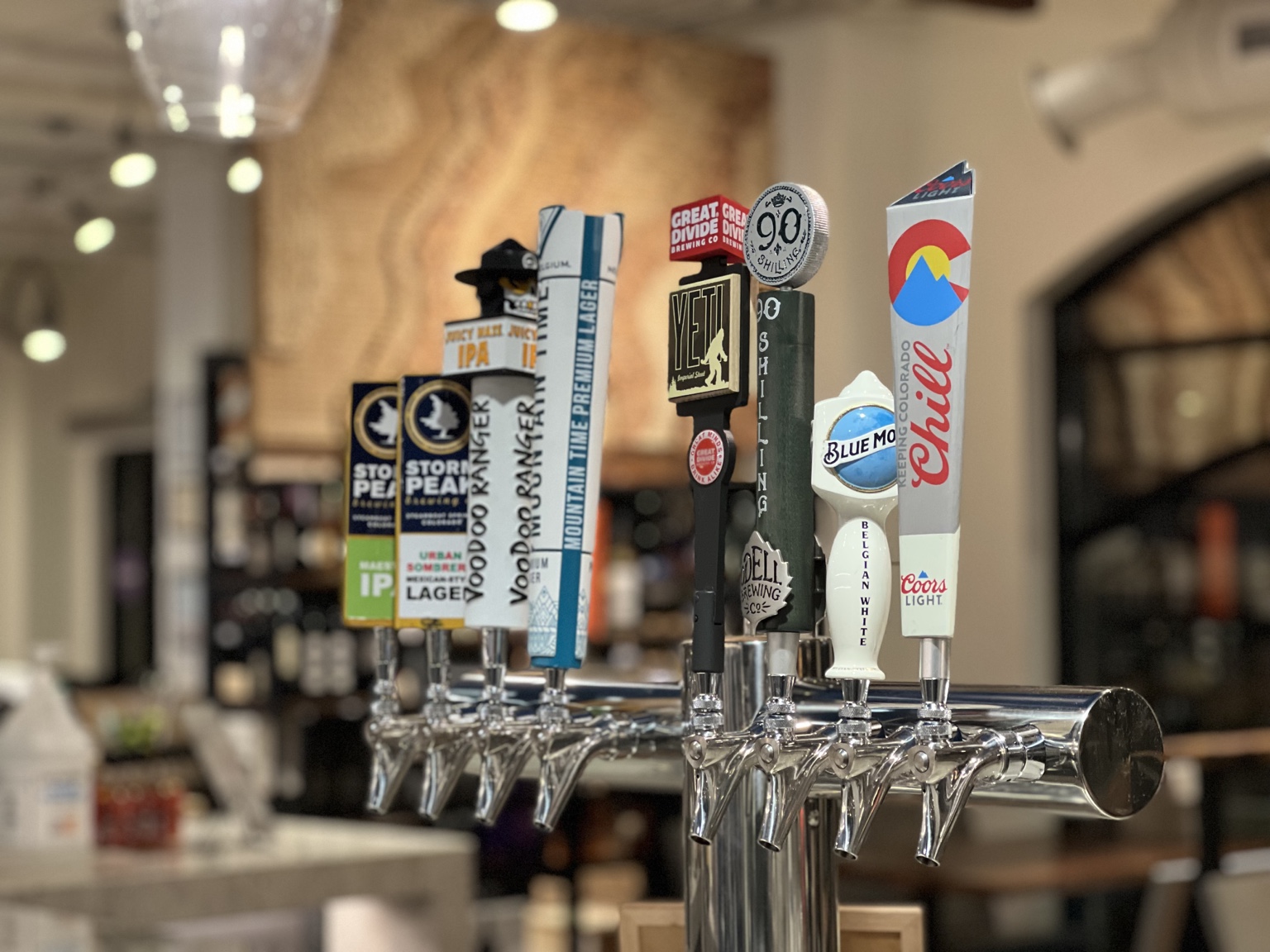 Local and Colorado beer tap handles at the Wild Plum bar
